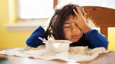 sleep problems in children at kithchen table