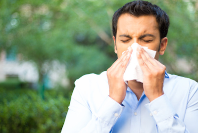 develop allergies man sneezing