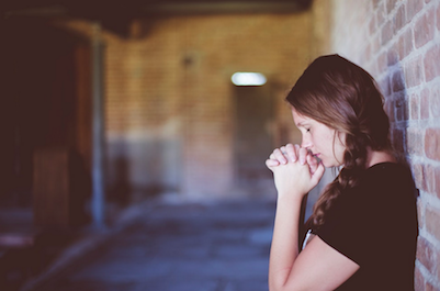 acute anxiety disorder woman praying