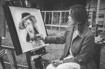 ibd woman painting mans sad face